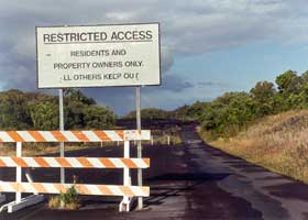 Lava closure of state route 130, with resident/landowner restricted access sign